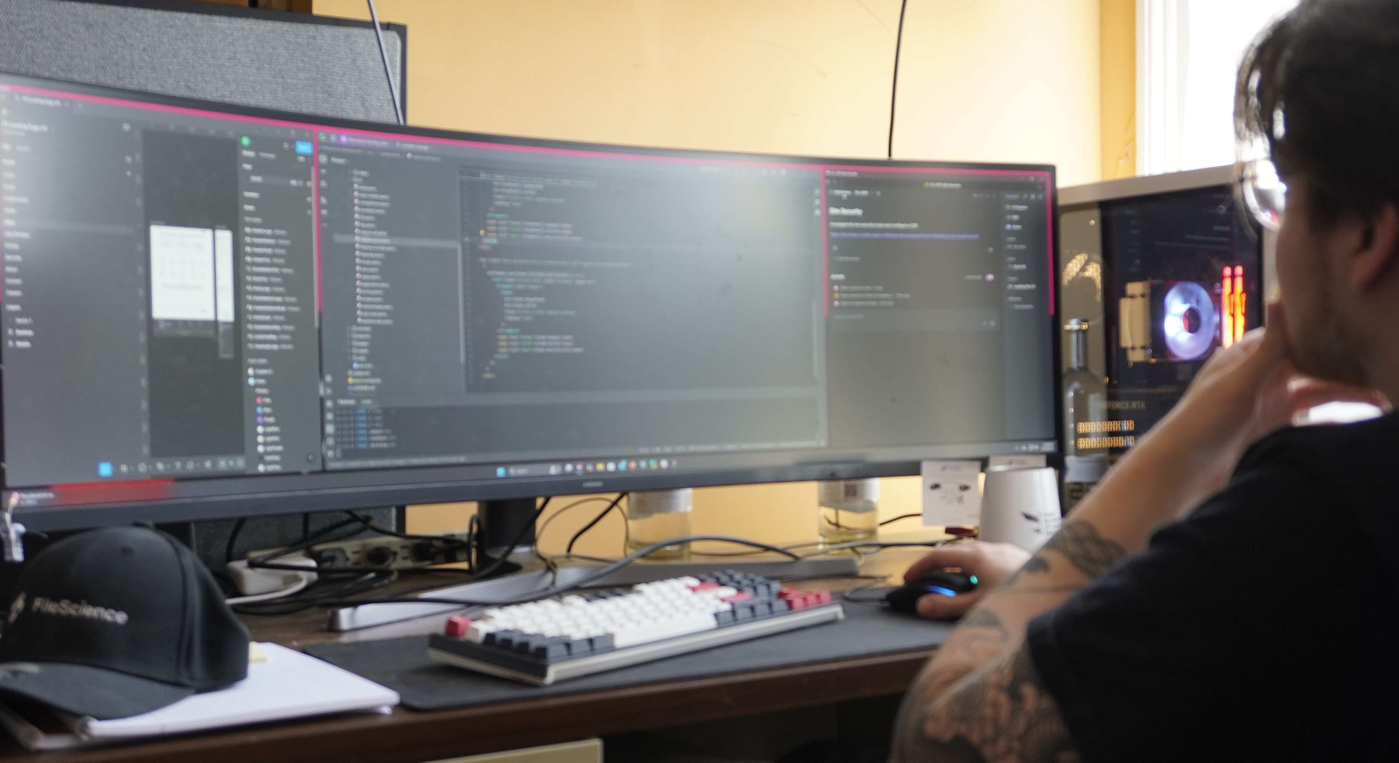 Candid photo of FileScience team member working collaboratively in a modern office environment
